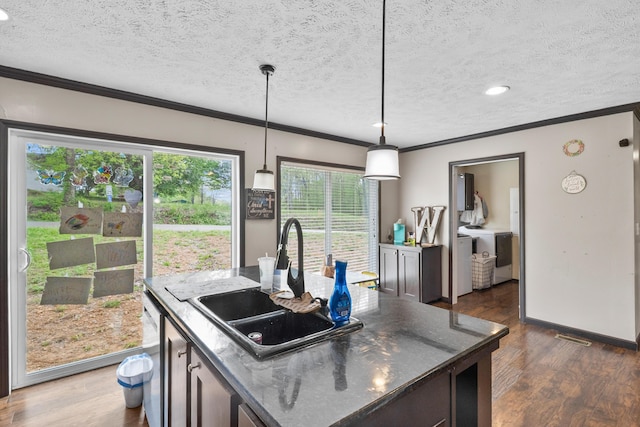 6989 W Laurel Rd, London, KY 40741 - kitchen featuring a sink, crown molding, and dark wood-style floors