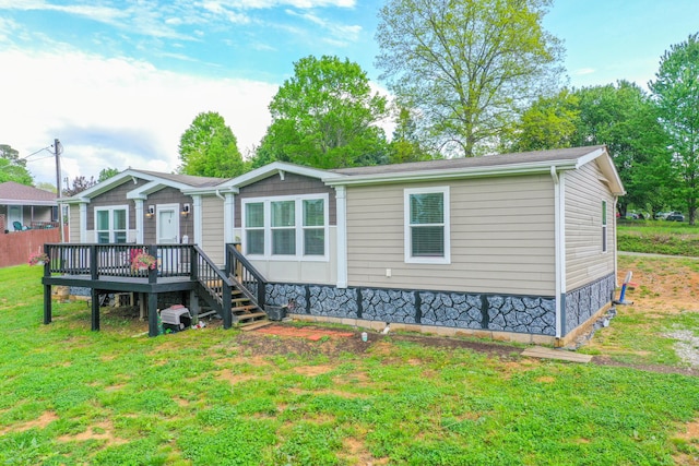 6989 W Laurel Rd, London, KY 40741 - view of front facade featuring a wooden deck, a front lawn, and crawl space