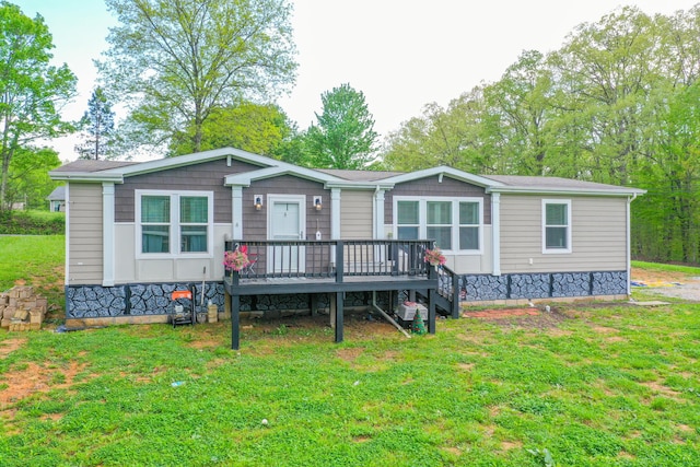 6989 W Laurel Rd, London, KY 40741 - manufactured / mobile home featuring a deck and a front yard