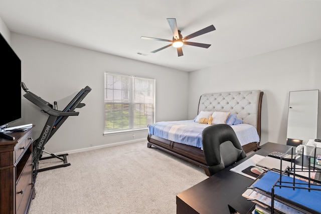 bedroom with carpet floors, baseboards, visible vents, and ceiling fan