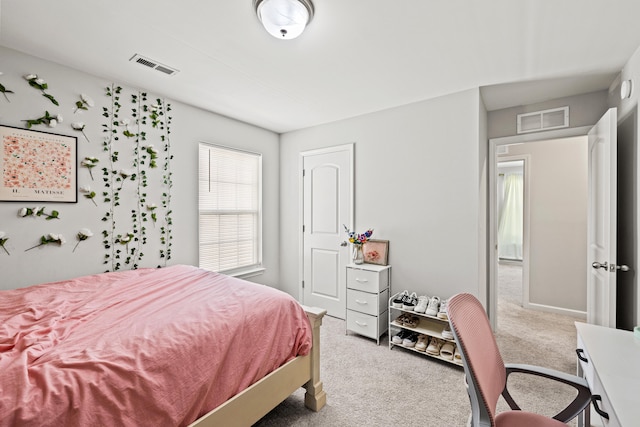 bedroom featuring visible vents and carpet flooring