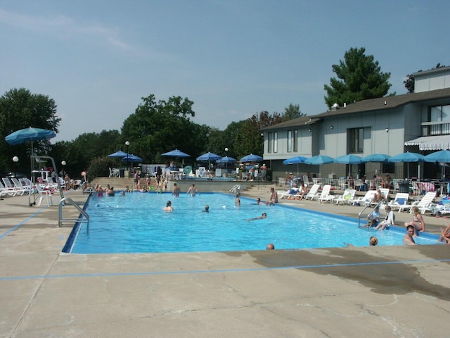 pool with a patio
