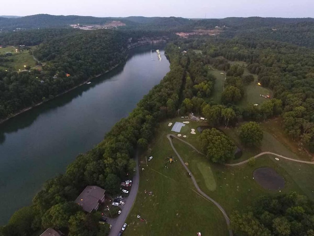 bird's eye view with a wooded view and a water and mountain view