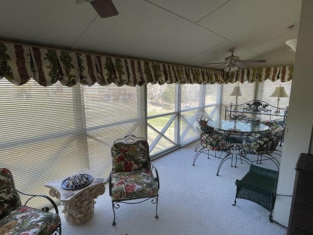 sunroom / solarium with ceiling fan