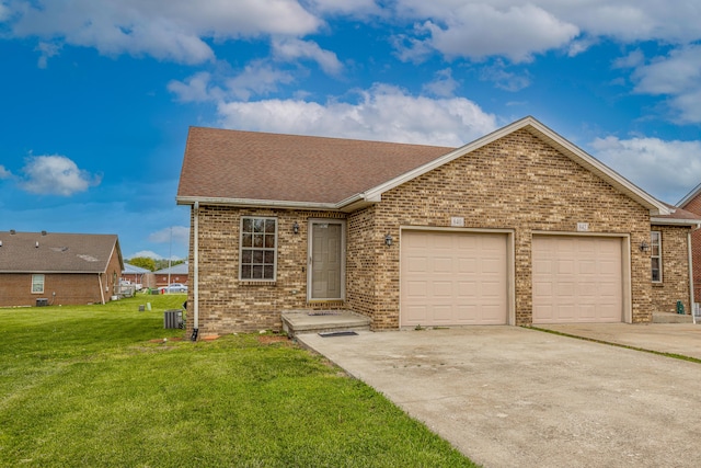 single story home featuring a front yard, brick siding, concrete driveway, an attached garage, and a shingled roof