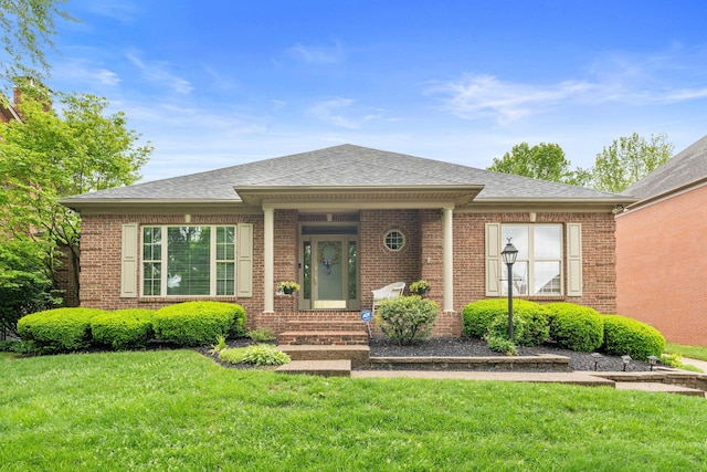 3283 Snaffle Rd, Lexington, KY 40513 - view of front of home featuring brick siding and a front yard