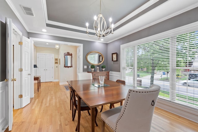 3283 Snaffle Rd, Lexington, KY 40513 - dining area with plenty of natural light, a chandelier, light wood-style flooring, and crown molding
