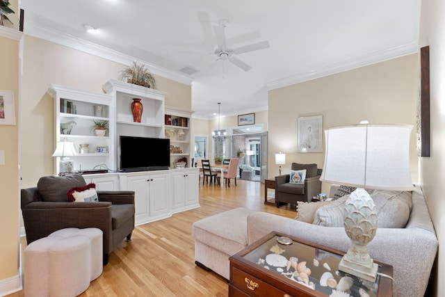 3283 Snaffle Rd, Lexington, KY 40513 - living room with light wood finished floors, crown molding, and a ceiling fan