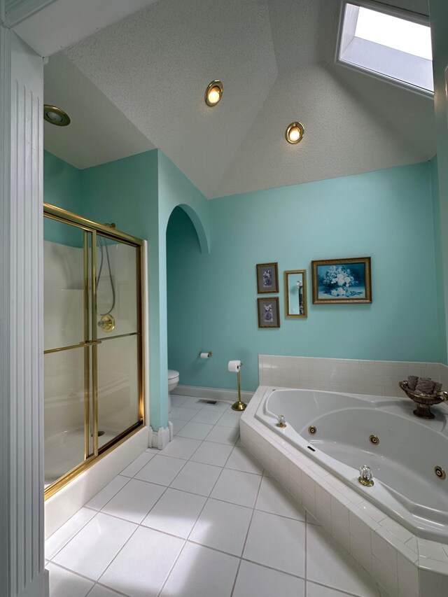 101 Wildwood Dr, Somerset, KY 42503 - bathroom featuring a jetted tub, a shower stall, tile patterned floors, baseboards, and toilet