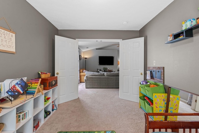 recreation room featuring carpet floors and ceiling fan