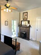 519 Ann St, Frankfort, KY 40601 - bedroom with a fireplace