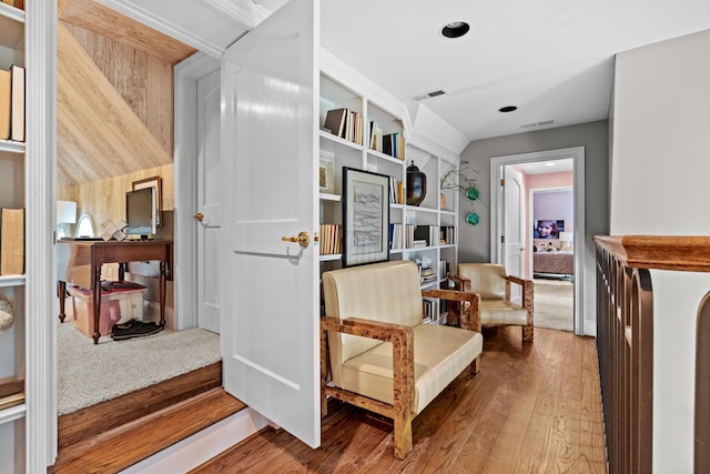 interior space featuring visible vents, recessed lighting, and wood finished floors