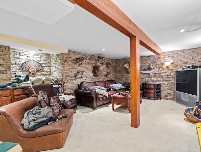 living room with light carpet and beam ceiling