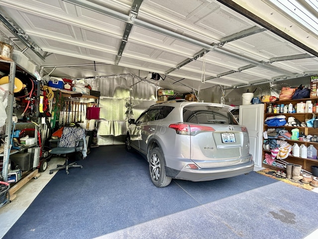 garage featuring a garage door opener