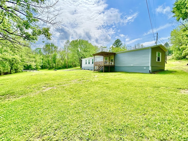 view of yard with a deck