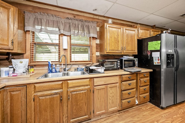 2616 Doylesville Rd, Richmond, KY 40475 - kitchen featuring appliances with stainless steel finishes, a sink, light countertops, light wood finished floors, and a drop ceiling