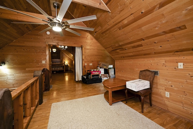 2616 Doylesville Rd, Richmond, KY 40475 - living area featuring wooden walls, vaulted ceiling with beams, a ceiling fan, and wood finished floors