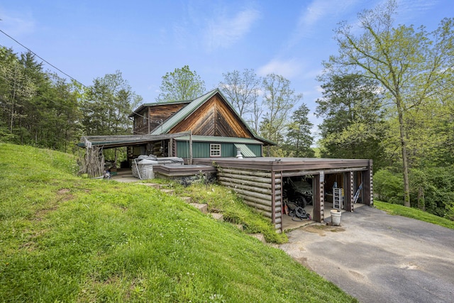 2616 Doylesville Rd, Richmond, KY 40475 - log home with a carport and driveway