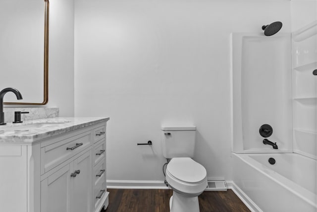 342 Prescott Rd, Paris, KY 40361 - bathroom featuring wood finished floors, baseboards, vanity, toilet, and  shower combination
