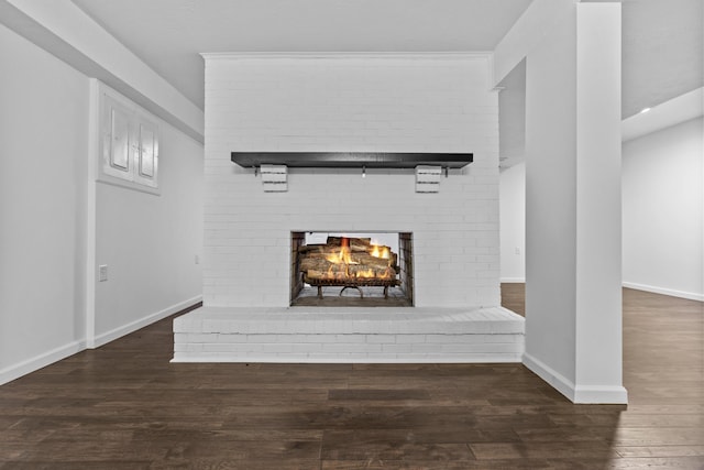 342 Prescott Rd, Paris, KY 40361 - unfurnished living room featuring baseboards, wood finished floors, and a fireplace