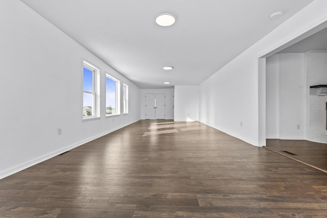 342 Prescott Rd, Paris, KY 40361 - unfurnished living room with baseboards, dark wood finished floors, and a fireplace