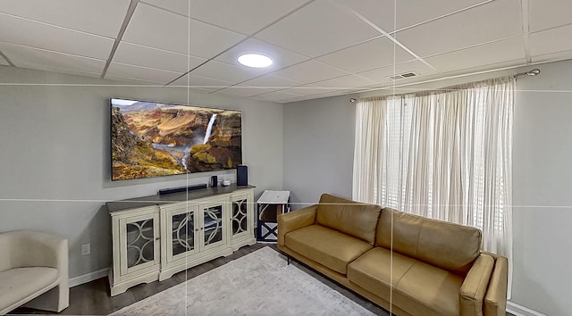 132 Mason Springs Dr, Nicholasville, KY 40356 - living area with wood finished floors, a drop ceiling, and baseboards