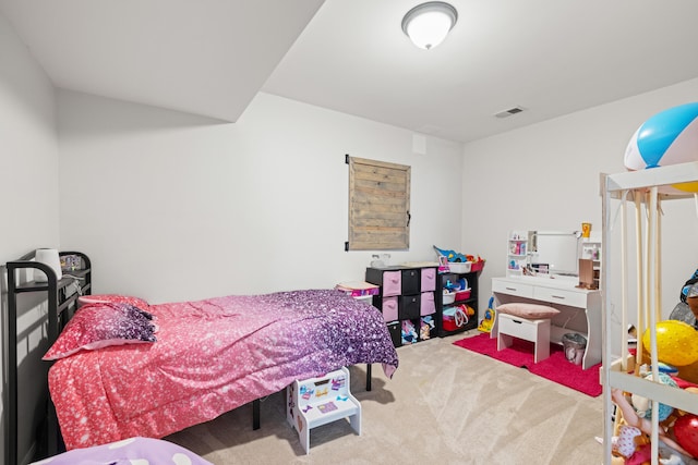 carpeted bedroom with visible vents