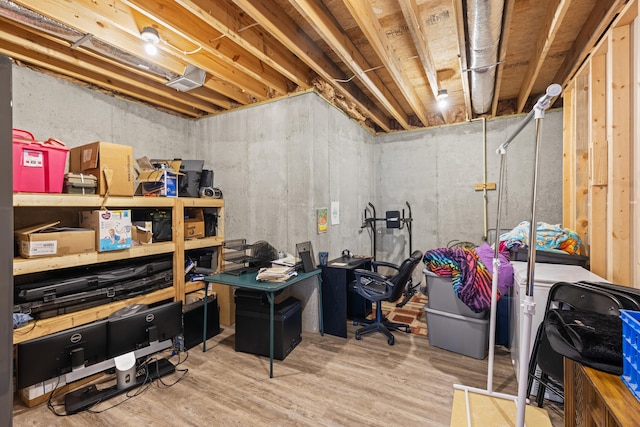 unfinished basement with wood finished floors