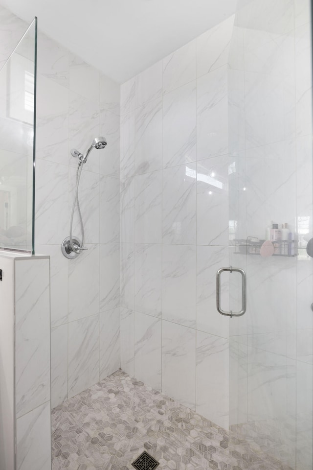 bathroom featuring a stall shower