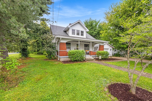 123 Baughman Ave, Danville, KY 40422 - bungalow-style house featuring covered porch, brick siding, roof with shingles, and a front lawn