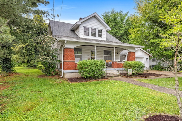 123 Baughman Ave, Danville, KY 40422 - bungalow-style home featuring roof with shingles, brick siding, a porch, a front yard, and a chimney