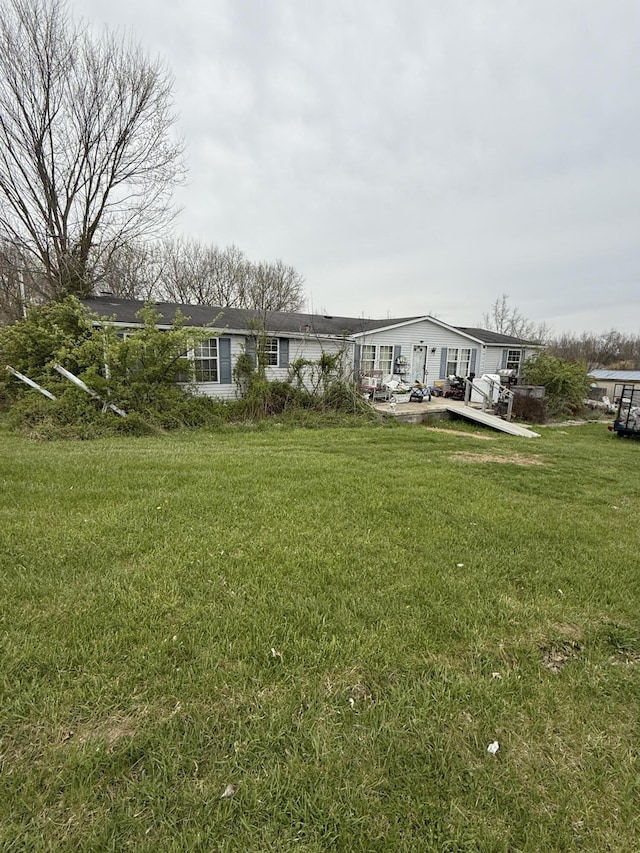 exterior space featuring a front lawn