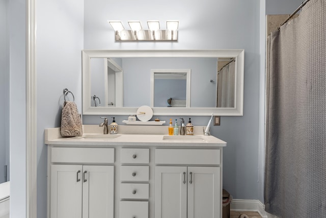 963 Star Shoot Pkwy, Lexington, KY 40509 - bathroom featuring a sink, a shower with curtain, toilet, and double vanity