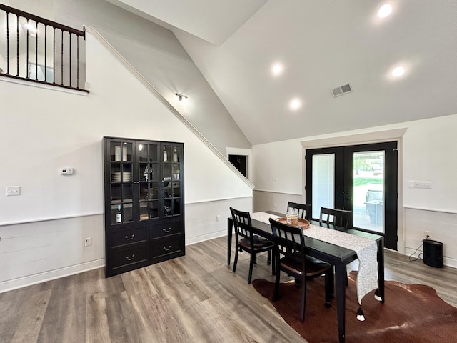 11 Marco Island Dr, Somerset, KY 42503 - dining space featuring french doors, wood finished floors, lofted ceiling, and recessed lighting