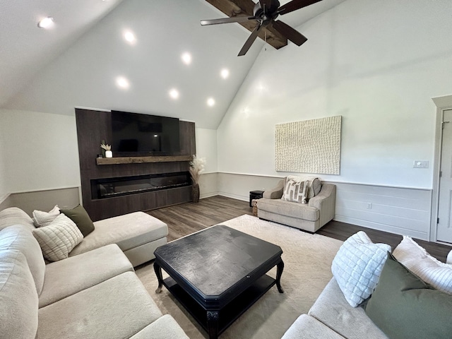 11 Marco Island Dr, Somerset, KY 42503 - living room featuring wood finished floors, ceiling fan, a glass covered fireplace, high vaulted ceiling, and recessed lighting
