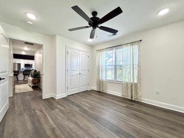 11 Marco Island Dr, Somerset, KY 42503 - unfurnished bedroom featuring dark wood-style flooring, baseboards, and recessed lighting