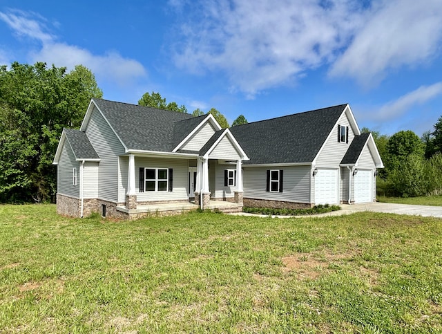 108 Patriot Dr, Science Hill, KY 42553 - view of front of house featuring concrete driveway, a porch, a shingled roof, a front yard, and an attached garage