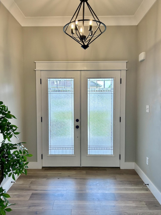 108 Patriot Dr, Science Hill, KY 42553 - doorway featuring french doors, a chandelier, and wood finished floors