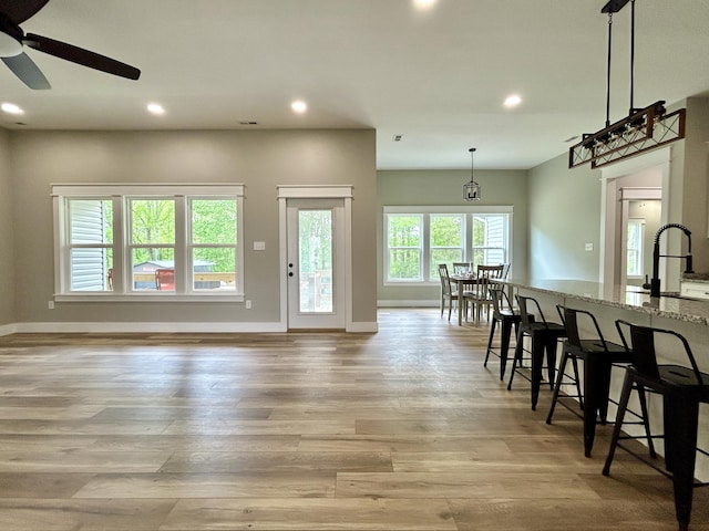 108 Patriot Dr, Science Hill, KY 42553 - living room featuring recessed lighting, light wood-type flooring, a ceiling fan, and baseboards