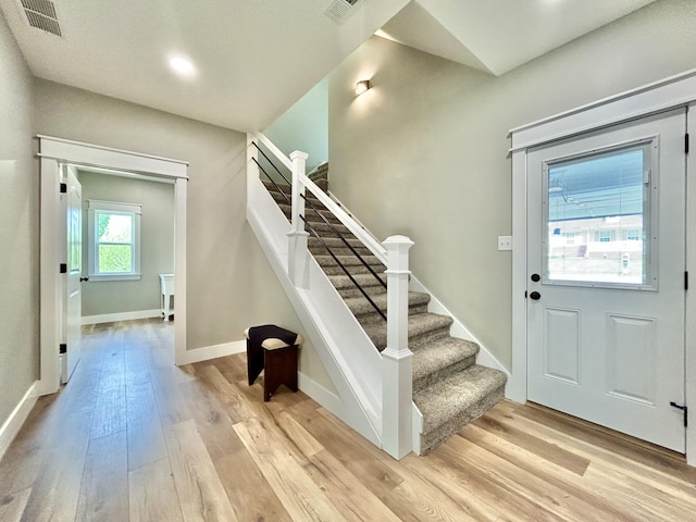 108 Patriot Dr, Science Hill, KY 42553 - entrance foyer with light wood-type flooring, stairway, and baseboards