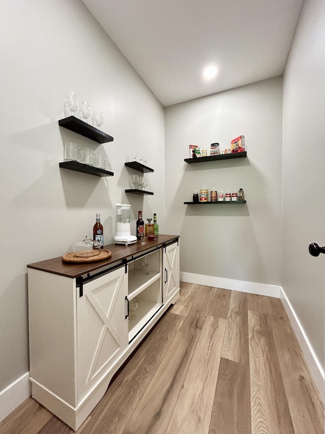 108 Patriot Dr, Science Hill, KY 42553 - indoor dry bar featuring light wood finished floors and baseboards