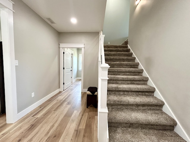 108 Patriot Dr, Science Hill, KY 42553 - staircase featuring wood finished floors and baseboards