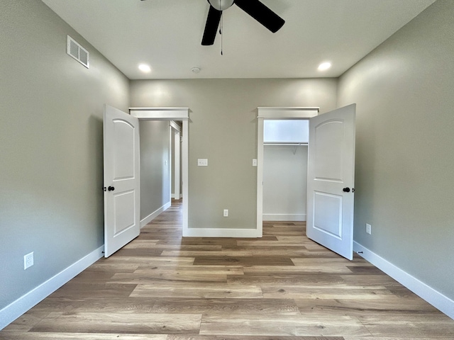 108 Patriot Dr, Science Hill, KY 42553 - unfurnished bedroom with light wood-style flooring, ceiling fan, baseboards, recessed lighting, and a spacious closet