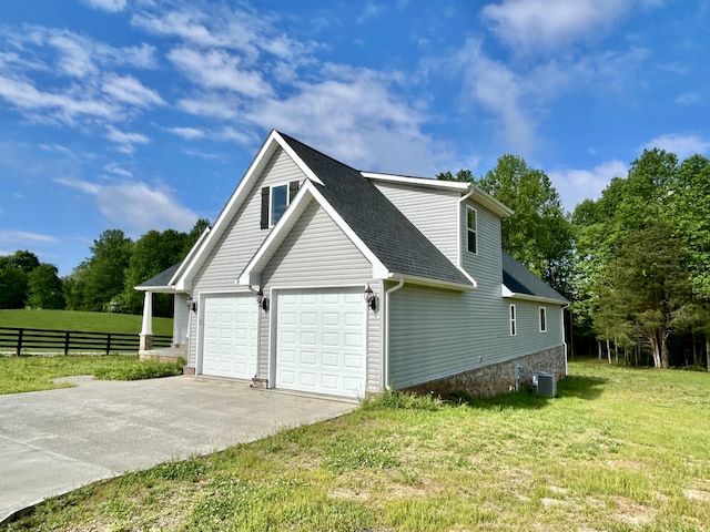 108 Patriot Dr, Science Hill, KY 42553 - view of side of home with a garage, concrete driveway, cooling unit, and roof with shingles