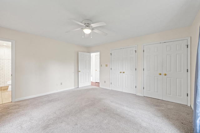 1021 Fairway Dr, Georgetown, KY 40324 - unfurnished bedroom featuring carpet floors, two closets, baseboards, and ensuite bath