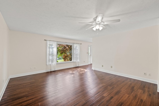 1021 Fairway Dr, Georgetown, KY 40324 - empty room with ceiling fan, baseboards, dark wood-type flooring, and a textured ceiling