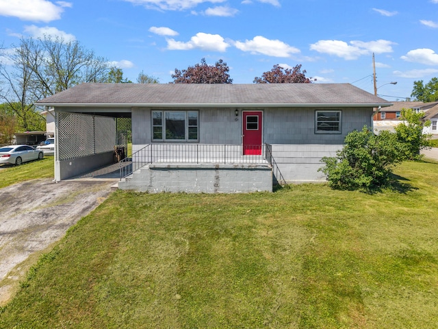 247 Sycamore St, Somerset, KY 42501 - single story home with a front yard, an attached carport, a shingled roof, and driveway