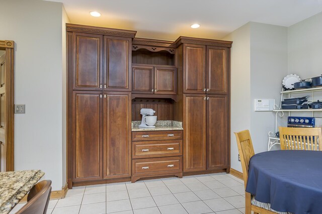 interior space with light tile patterned floors