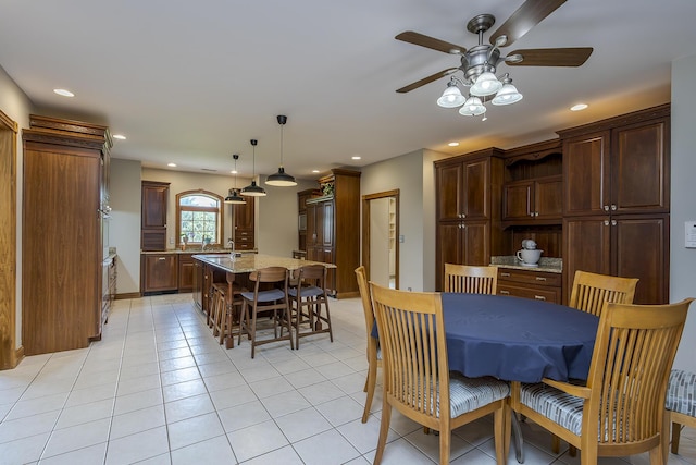 dining room with light tile patterned floors, ceiling fan, and recessed lighting