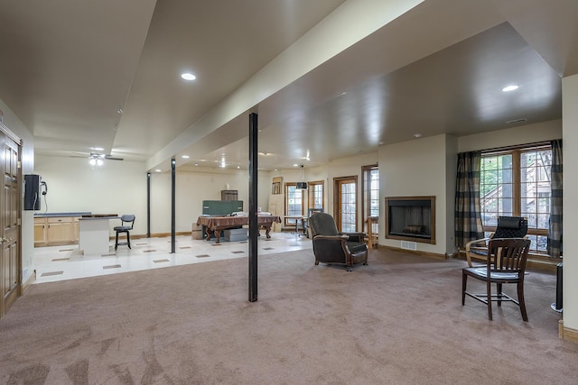 below grade area with baseboards, billiards, recessed lighting, and light carpet